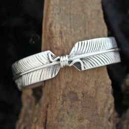 Two Feathers Sterling Silver