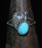 Turquoise Ring With Sterling Silver Ornaments