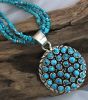 Turquoise Medallion On Three Strand Turquoise Necklace