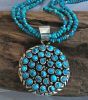 Turquoise Medallion On Three Strand Turquoise Necklace