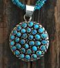 Turquoise Medallion On Three Strand Turquoise Necklace