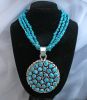 Turquoise Medallion On Three Strand Turquoise Necklace