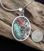 Turquoise And Coral Pendant With Sterling Silver Flower And Star Design